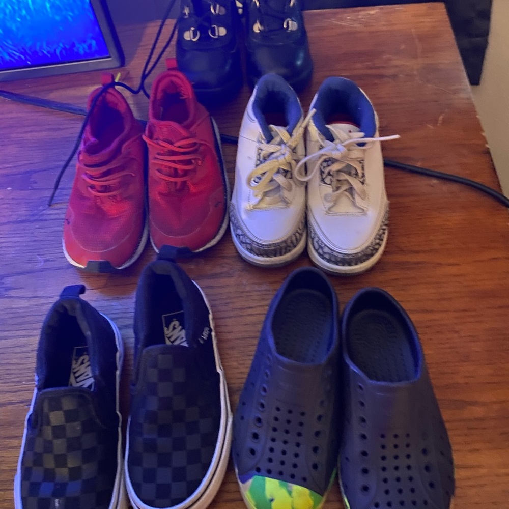lot of boys shoes all 5 pairs